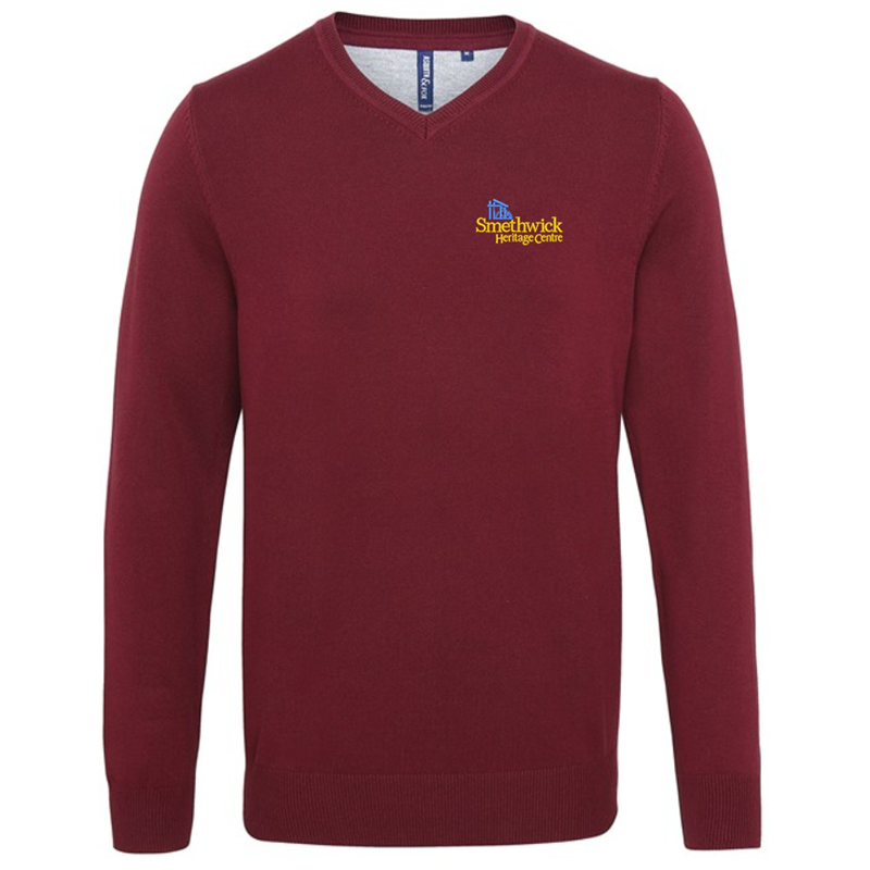 V-neck style jumper. Patch on the inside reverse neck for a contrast effect. Decorative tuck stitching. Ribbed knit on the neckline, cuffs and hem.Washing Instructions Domestic wash at 40c. With logo embroidered.