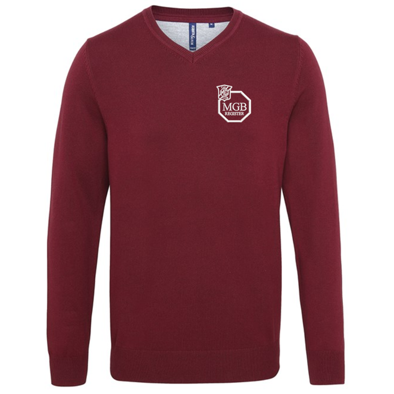 V-neck style jumper. Patch on the inside reverse neck for a contrast effect. Decorative tuck stitching. Ribbed knit on the neckline, cuffs and hem.Washing Instructions Domestic wash at 40c. With logo embroidered.