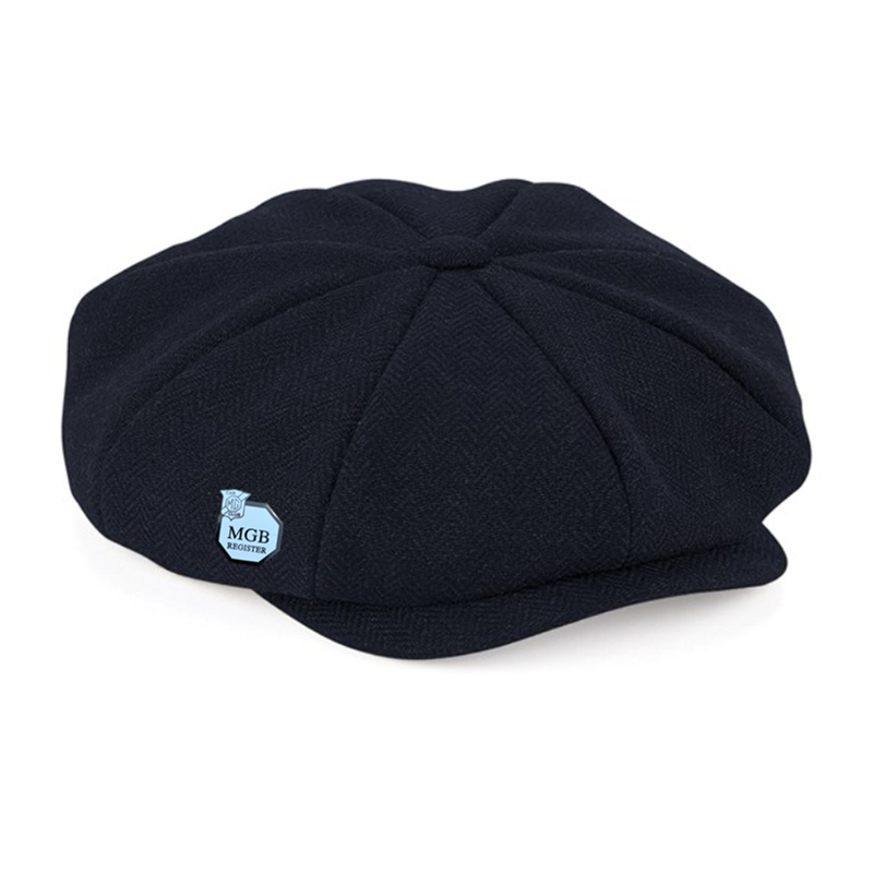 Traditional style has been given a modern revival with the heritage baker boy cap. Crafted from a luxe herringbone weave fabric, it’s time to take a closer look at this timeless silhouette. Includes MGB lapel badge!