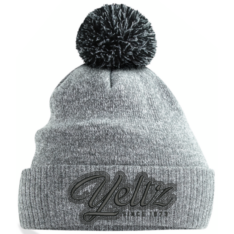 Knitted beanie hat with contrast pom pom, embroidered with club logo to front.